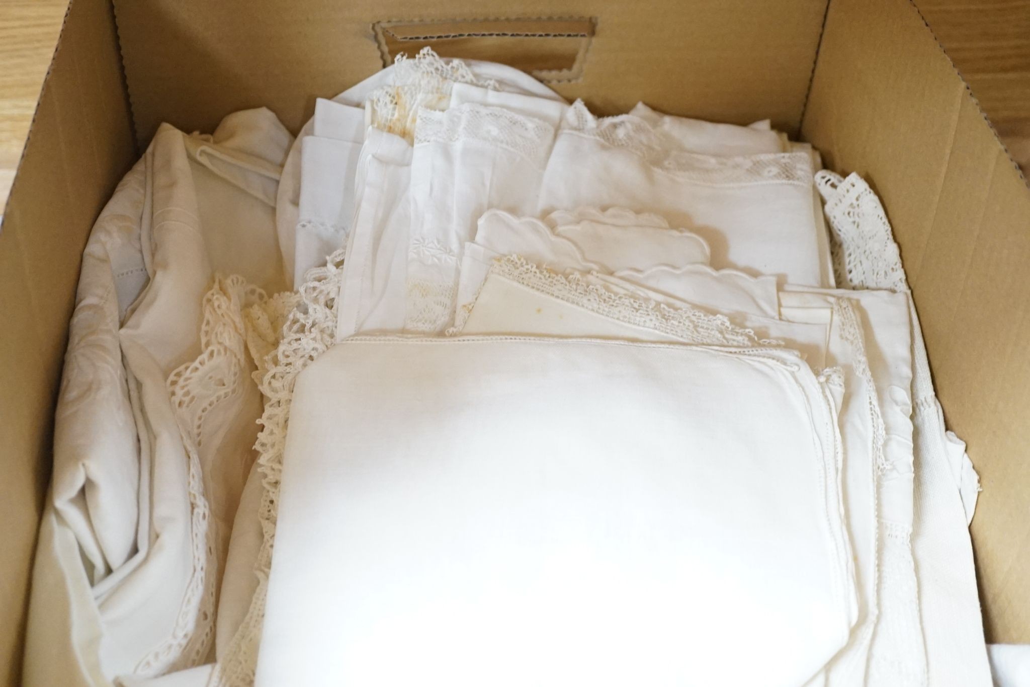 A quantity of cut-work and other table linens.